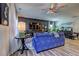 Stylish living room with modern furnishings, hardwood floors, and ample space for entertaining at 1014 Starmoss Ln, Conyers, GA 30094