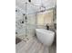 Luxurious bathroom featuring standalone tub, glass-enclosed shower with sleek fixtures, and modern design at 125 Abner Dr, Mcdonough, GA 30252