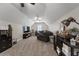 Spacious bonus room features a comfortable sofa, entertainment center, and neutral carpet at 125 Abner Dr, Mcdonough, GA 30252