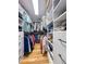 Walk-in closet with custom shelving and storage solutions, providing ample space for clothes and accessories at 125 Abner Dr, Mcdonough, GA 30252