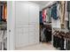 Walk-in closet featuring custom shelving and ample storage space at 2220 Peachtree Rd, Cumming, GA 30041