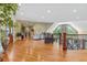 Open foyer with wood floors, high ceilings, and stairway to second level at 2220 Peachtree Rd, Cumming, GA 30041