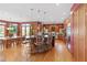 Spacious kitchen features hardwood floors, large windows, a center island, and stainless appliances at 2220 Peachtree Rd, Cumming, GA 30041
