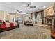 Expansive main bedroom features a stone fireplace, seating area, and plenty of natural light at 2220 Peachtree Rd, Cumming, GA 30041