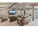 Basement home theater with leather reclining chairs, large television and soft carpet at 3233 Bagley Psge, Duluth, GA 30097