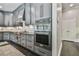 Modern kitchen featuring premium stainless steel appliances and custom cabinetry at 3233 Bagley Psge, Duluth, GA 30097
