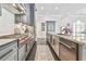 Efficient kitchen with a gas cooktop, stainless steel appliances, and sleek countertops at 3233 Bagley Psge, Duluth, GA 30097