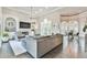 Spacious living room featuring a fireplace, built-in shelving, and large windows at 3233 Bagley Psge, Duluth, GA 30097