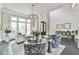 Cozy living area showcasing a neutral color palette, plush seating, and elegant decor at 3233 Bagley Psge, Duluth, GA 30097