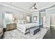The main bedroom includes a tray ceiling, soft colors, and hardwood floors at 3233 Bagley Psge, Duluth, GA 30097