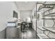 This office features built-in shelving, desk space, and dark wood floors at 3233 Bagley Psge, Duluth, GA 30097