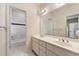 Bathroom with double sinks, large mirrors, and a tub/shower combination at 1272 Saxony Se Dr, Conyers, GA 30013