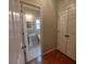Cozy half-bathroom featuring a pedestal sink and tiled floors at 1272 Saxony Se Dr, Conyers, GA 30013