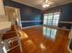 Dining space with hardwood floors, blue walls, and bright natural light at 1272 Saxony Se Dr, Conyers, GA 30013