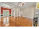 Expansive living room showcasing hardwood floors, a fireplace, and multiple access points at 1272 Saxony Se Dr, Conyers, GA 30013