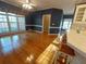 Open concept living room with natural light and hardwood floors at 1272 Saxony Se Dr, Conyers, GA 30013