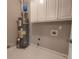 Modern water heater and clean storage in the utility room, efficient and functional at 1272 Saxony Se Dr, Conyers, GA 30013