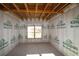 Unfinished basement with insulation and a window at 2019 Fern Mountain Ln, Marietta, GA 30064