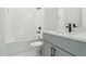 A bathroom featuring a tub and a shower at 2019 Fern Mountain Ln, Marietta, GA 30064