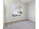 Bedroom featuring gray carpet and a window at 2019 Fern Mountain Ln, Marietta, GA 30064