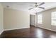Open living room with a ceiling fan, and hardwood flooring, perfect for entertaining at 2386 Mills Bnd, Decatur, GA 30034