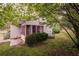 View of the back of the house including a screened in back porch area at 4715 Hill Rd, Powder Springs, GA 30127