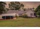 Side view of the home with a carport at 4715 Hill Rd, Powder Springs, GA 30127