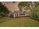 Charming two-story home with a well-maintained lawn and inviting front porch at 4715 Hill Rd, Powder Springs, GA 30127