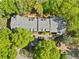 Overhead shot of the property with a well-maintained roof, ample parking, and beautiful greenery at 1234 Weatherstone Ne Dr, Atlanta, GA 30324