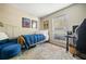 Bright bedroom featuring a comfortable bed, complementary furnishings, and natural light from a large window at 1234 Weatherstone Ne Dr, Atlanta, GA 30324