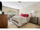 Serene bedroom featuring a large window, plush bedding, and neutral walls creating a cozy atmosphere at 1234 Weatherstone Ne Dr, Atlanta, GA 30324