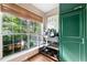 Bright kitchen with an oversized window, woven shade, and a beverage station at 1234 Weatherstone Ne Dr, Atlanta, GA 30324