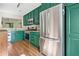 Updated kitchen features stainless steel appliances and emerald cabinets at 1234 Weatherstone Ne Dr, Atlanta, GA 30324