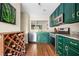 Cozy kitchen with emerald cabinets and stainless steel appliances at 1234 Weatherstone Ne Dr, Atlanta, GA 30324