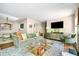 Bright living room features a comfortable couch, neutral walls, and a decorative rug at 1234 Weatherstone Ne Dr, Atlanta, GA 30324