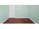 Simple bedroom with hardwood floors and fresh paint at 1248 To Lani Ct, Stone Mountain, GA 30083