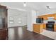 Open-concept living room and kitchen with hardwood floors and natural light at 1248 To Lani Ct, Stone Mountain, GA 30083