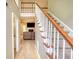 Spacious foyer with staircase and view to the living room at 1761 Mcdaniel Mill Rd Sw, Conyers, GA 30094