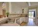 Well-appointed kitchen with stainless steel appliances, bright white cabinetry, and hardwood floors at 1761 Mcdaniel Mill Rd Sw, Conyers, GA 30094