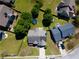 Aerial view of a home with a large backyard, neighboring houses, and long driveway at 3049 Battlement, Loganville, GA 30052