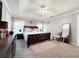 Charming main bedroom features a decorative ceiling, plush carpet, and ample natural light at 3049 Battlement, Loganville, GA 30052
