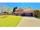 Beautiful two-story home boasting a well-maintained lawn, brick facade, and inviting curb appeal at 3049 Battlement, Loganville, GA 30052