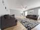 Expansive living room with hardwood floors, comfortable seating, and lots of natural light at 3049 Battlement, Loganville, GA 30052