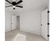 Bedroom with ceiling fan and adjoining doorway at 5086 Cumberland Ct, Villa Rica, GA 30180