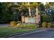 Community entrance with lush landscaping at 5086 Cumberland Ct, Villa Rica, GA 30180