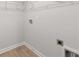 A well-equipped laundry room area with white walls and tile floor at 5086 Cumberland Ct, Villa Rica, GA 30180