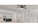 Open concept living area with modern kitchen, spacious living room, and staircase at 5086 Cumberland Ct, Villa Rica, GA 30180