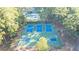 Aerial view of tennis and basketball courts, highlighting community recreational amenities at 5086 Cumberland Ct, Villa Rica, GA 30180