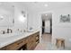 Elegant bathroom with double vanity, modern sinks, shiplap wall design, and hex tile flooring at 6255 Lakeview Dr, Buford, GA 30518