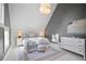 Bright bedroom featuring stylish furniture, a neutral color palette, and great natural light at 6255 Lakeview Dr, Buford, GA 30518